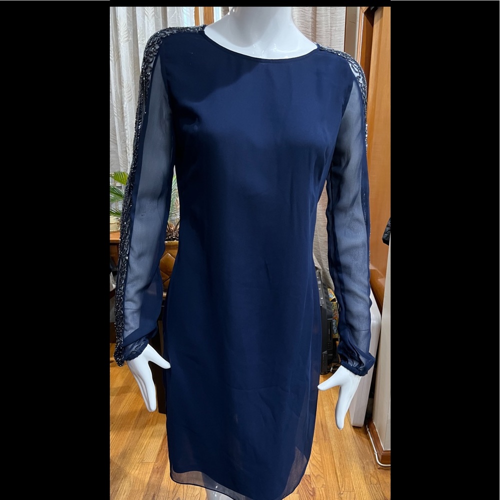 Boutique Beautiful Navy Blue Dress with Shear Sleeves with Beading Details.